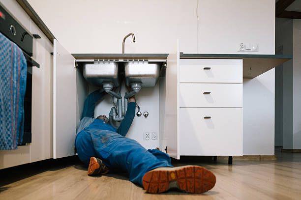 Professional Emergency Plumber technician working in Water Mill, NY